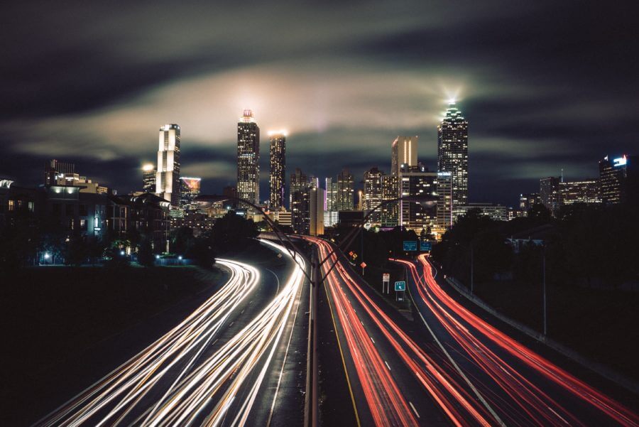City at night, with motion-blur traffic lights
